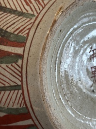 A Chinese Swatow green- and red-enamelled 'dragon' jar and a pair of covered bowls, Ming