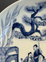 A Chinese blue and white plate with a breastfeeding woman and fishermen on boats, Yongzheng