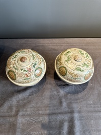 A Chinese Swatow green- and red-enamelled 'dragon' jar and a pair of covered bowls, Ming
