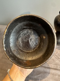 A pair of Chinese bronze vases with 'dragon' handles, Yuan/Ming