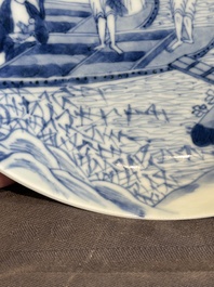 A Chinese blue and white plate with a breastfeeding woman and fishermen on boats, Yongzheng