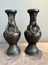 A pair of Chinese bronze vases with 'dragon' handles, Yuan/Ming