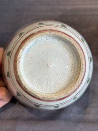 A Chinese Swatow green- and red-enamelled 'dragon' jar and a pair of covered bowls, Ming