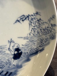 A Chinese blue and white plate with a breastfeeding woman and fishermen on boats, Yongzheng
