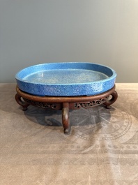 A Chinese robin's egg-glazed narcissus basin with a wooden stand, 19th C.