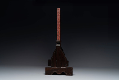 A rectangular Chinese carved red lacquer 'dragon' table screen, later wooden stand, Qianlong