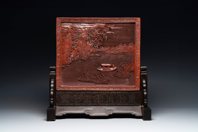 A rectangular Chinese carved red lacquer 'dragon' table screen, later wooden stand, Qianlong