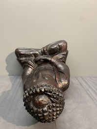 A gilt and lacquered wooden Buddha, Vietnam, 19th C.
