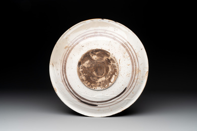 An Italian maiolica dish with a swordsman on horse, Montelupo, early 17th C.