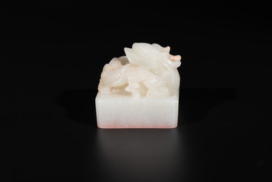 A Chinese white jade 'dragon' seal, Li Shiming 李世民 mark, Qing