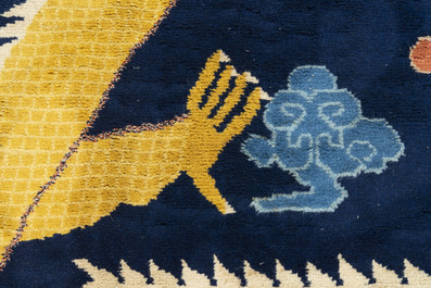 A Chinese inscribed woollen 'dragon' pillar carpet, 19th C.