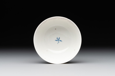 A Chinese gilt-decorated blue- and-puce-enamelled 'flower basket' cup and saucer, Qianlong