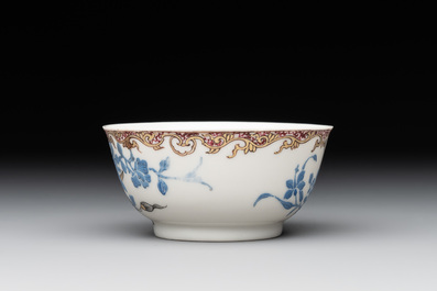 A Chinese gilt-decorated blue- and-puce-enamelled 'flower basket' cup and saucer, Qianlong