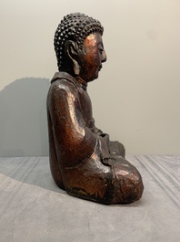 A gilt and lacquered wooden Buddha, Vietnam, 19th C.
