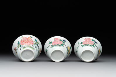 Three Chinese famille rose 'birds and flowers' cups and saucers, Yongzheng