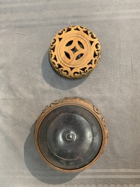 A pair of Chinese Imari-style 'grapevine' jars with wooden covers and stands, Kangxi
