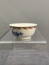 A Chinese gilt-decorated blue- and-puce-enamelled 'flower basket' cup and saucer, Qianlong