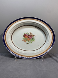 A Chinese export famille rose covered tureen and an oval dish with strainer, Jiaqing