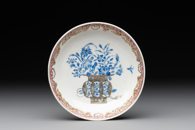 A Chinese gilt-decorated blue- and-puce-enamelled 'flower basket' cup and saucer, Qianlong
