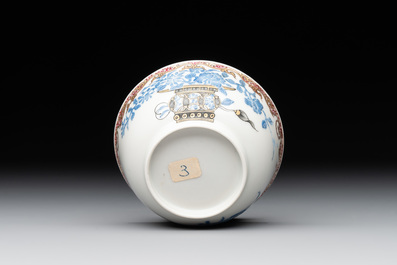 A Chinese gilt-decorated blue- and-puce-enamelled 'flower basket' cup and saucer, Qianlong