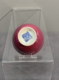 A fine Chinese ruby-ground famille rose 'magnolia' cup, Qianlong mark and of the period