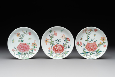 Three Chinese famille rose 'birds and flowers' cups and saucers, Yongzheng