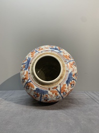 A pair of Chinese Imari-style 'grapevine' jars with wooden covers and stands, Kangxi