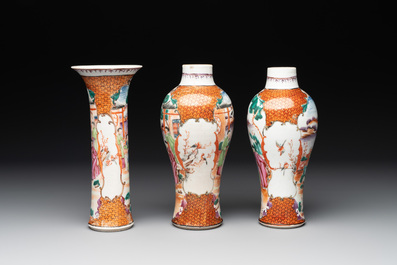 A Chinese famille rose 'mandarin subject' garniture of three vases, Qianlong