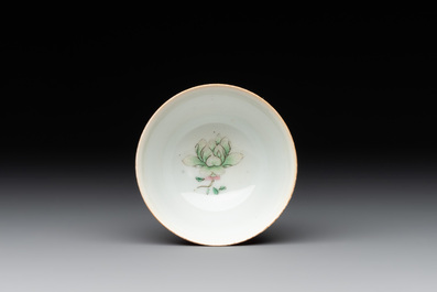 A fine Chinese ruby-ground famille rose 'magnolia' cup, Qianlong mark and of the period