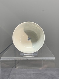A Chinese gilt-decorated blue- and-puce-enamelled 'flower basket' cup and saucer, Qianlong