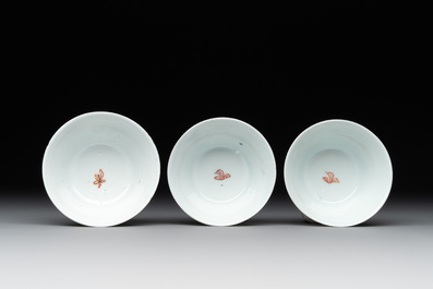 Three Chinese famille rose 'birds and flowers' cups and saucers, Yongzheng