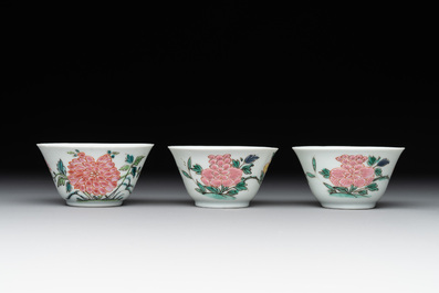 Three Chinese famille rose 'birds and flowers' cups and saucers, Yongzheng