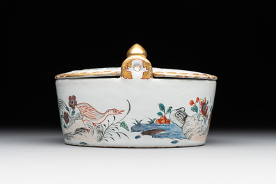 A polychrome Dutch Delft petit feu 'chinoiserie' butter tub and cover, 18th C.