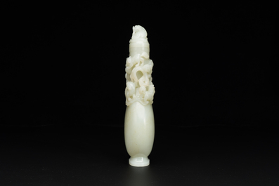 A fine Chinese white jade 'Buddhist lions' vase and cover, Qing