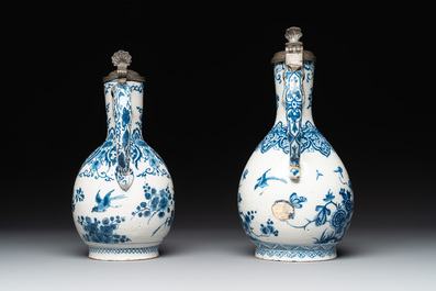 Two blue and white Dutch Delft jugs with pewter mounts, early 18th C.