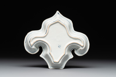 A blue and white Dutch Delft fleur-de-lys-shaped 'chinoiserie' dish, late 17th C.