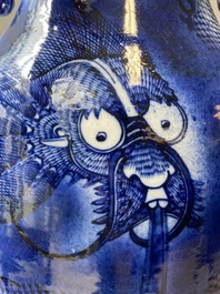 A Chinese blue and white 'dragon and carp' vase, 19th C.