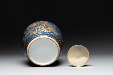 A Chinese gilt-decorated powder-blue 'phoenix' jar with a later silver cover, Qianlong