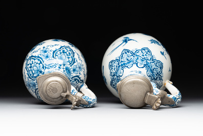 Two blue and white Dutch Delft jugs with pewter mounts, early 18th C.