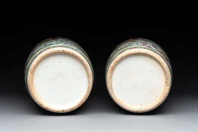A pair of Chinese Canton famille rose vases and two plates, 19th C.