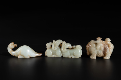 Three Chinese celadon and russet jade carvings of animals, 19th C.
