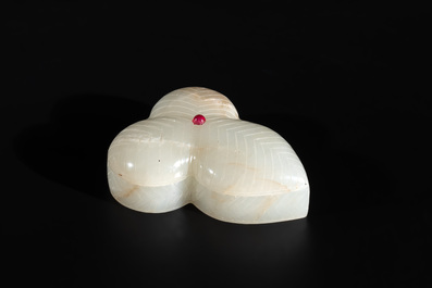 A Chinese Mughal-style leaf-shaped ruby-inset jade box and cover on wooden base, 18th C.