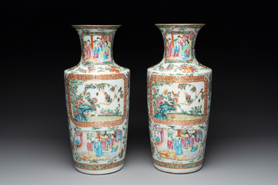 A pair of Chinese Canton famille rose vases and two plates, 19th C.