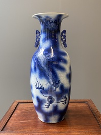 A Chinese blue and white 'dragon and carp' vase, 19th C.