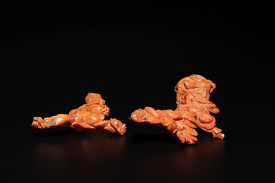 A Chinese pink-orange coral group of a goddess of spring, a wise man and children in a pine tree, 19/20th C.