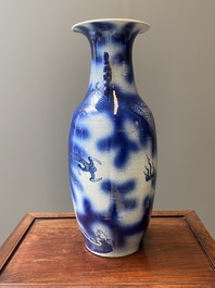 A Chinese blue and white 'dragon and carp' vase, 19th C.