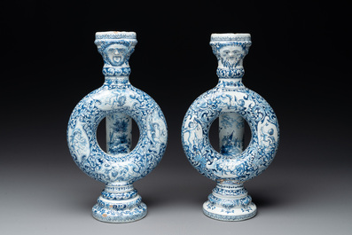 A pair of blue and white Dutch Delft circular jugs, 19th C.