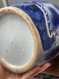 A Chinese blue and white 'dragon and carp' vase, 19th C.