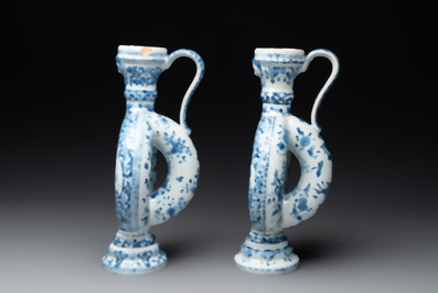 A pair of blue and white Dutch Delft circular jugs, 19th C.