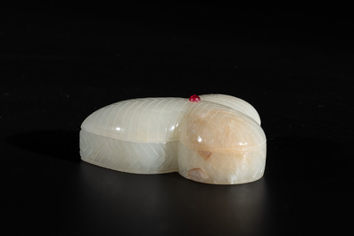 A Chinese Mughal-style leaf-shaped ruby-inset jade box and cover on wooden base, 18th C.